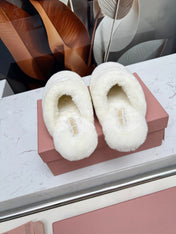 MIUMIU 26S MULES IN CREAM WHITE SHEARLING