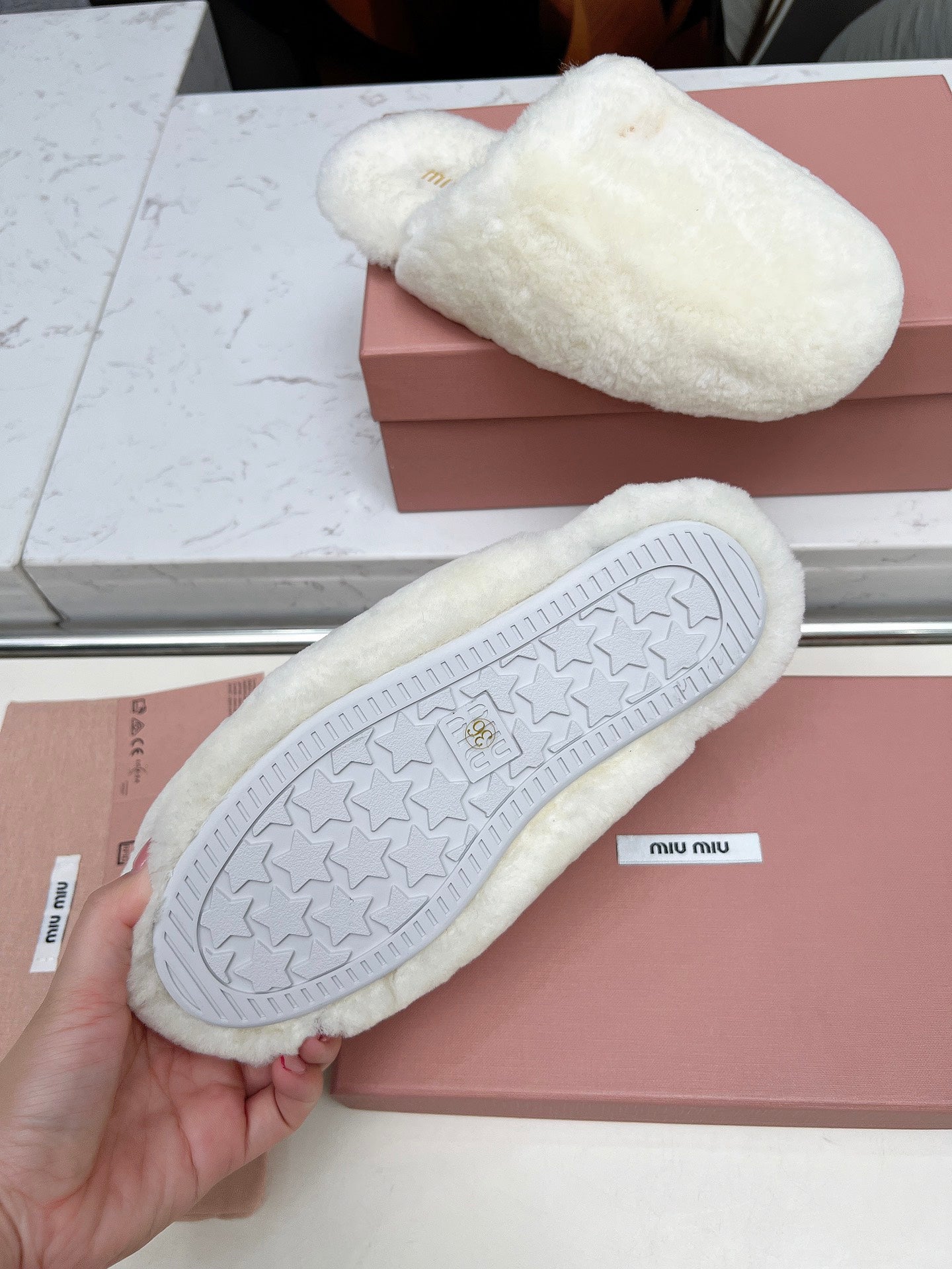 MIUMIU 26S MULES IN CREAM WHITE SHEARLING