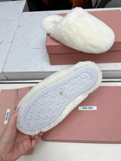 MIUMIU 26S MULES IN CREAM WHITE SHEARLING