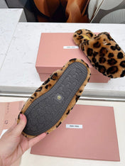MIUMIU 26S MULES IN LEOPARD PATTERN SHEARLING 