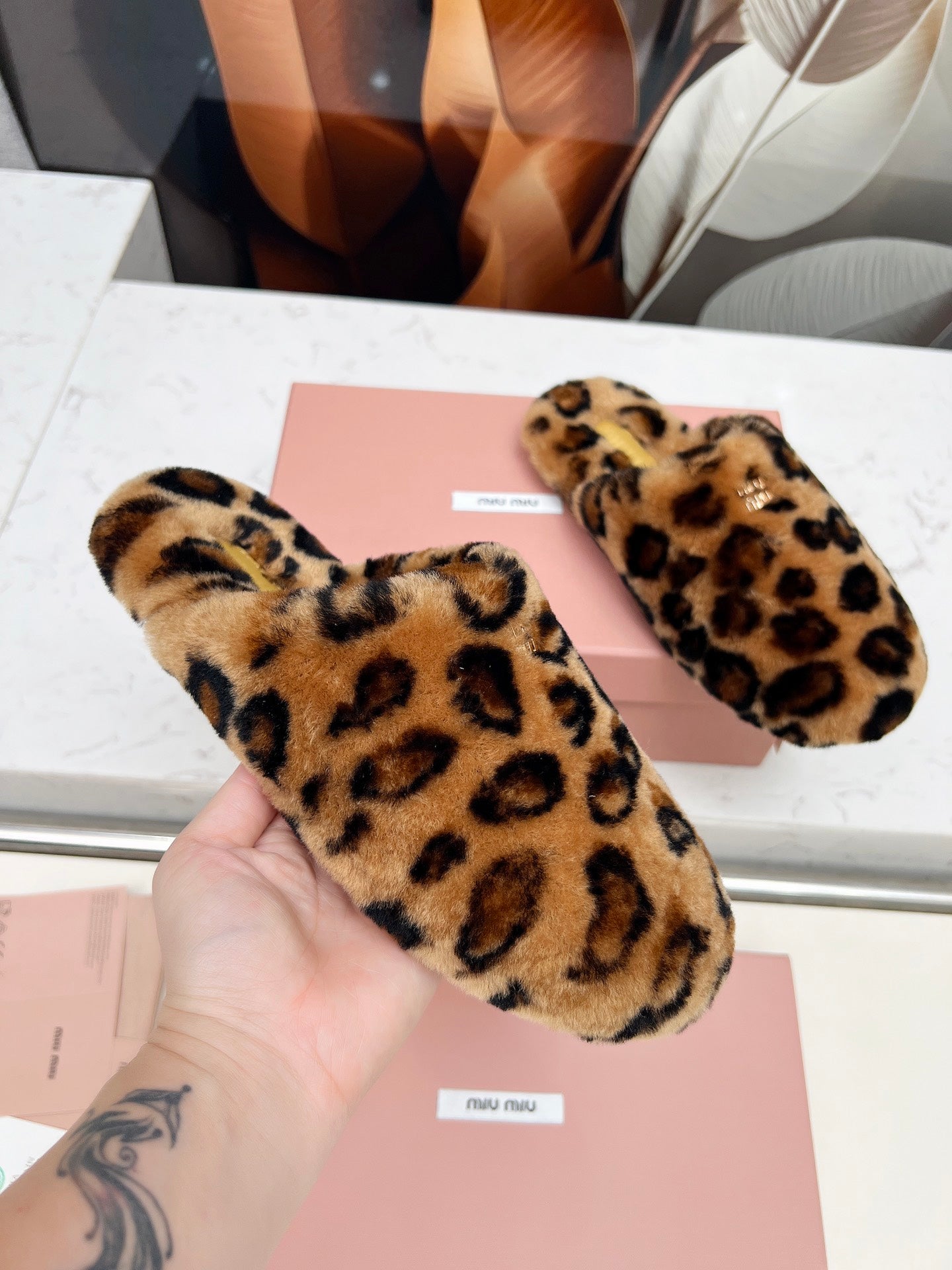MIUMIU 26S MULES IN LEOPARD PATTERN SHEARLING 
