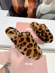 MIUMIU 26S MULES IN LEOPARD PATTERN SHEARLING 