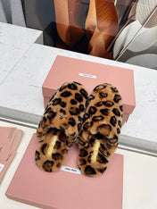 MIUMIU 26S MULES IN LEOPARD PATTERN SHEARLING 