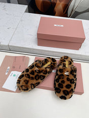 MIUMIU 26S MULES IN LEOPARD PATTERN SHEARLING 