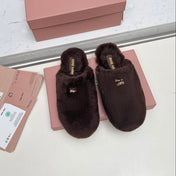 MIUMIU 26S MULES IN DARK BROWN SHEARLING 