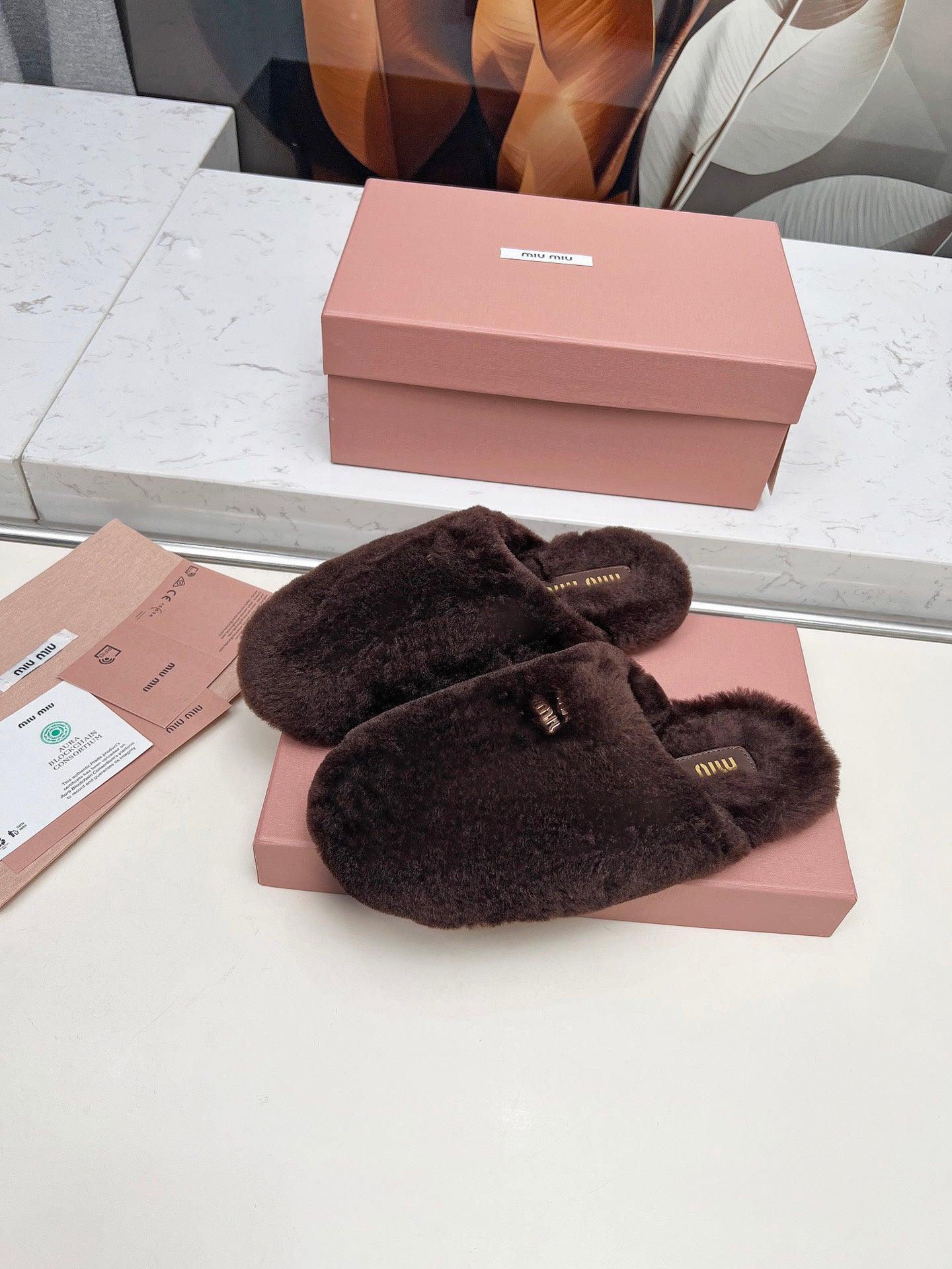 MIUMIU 26S MULES IN DARK BROWN SHEARLING 