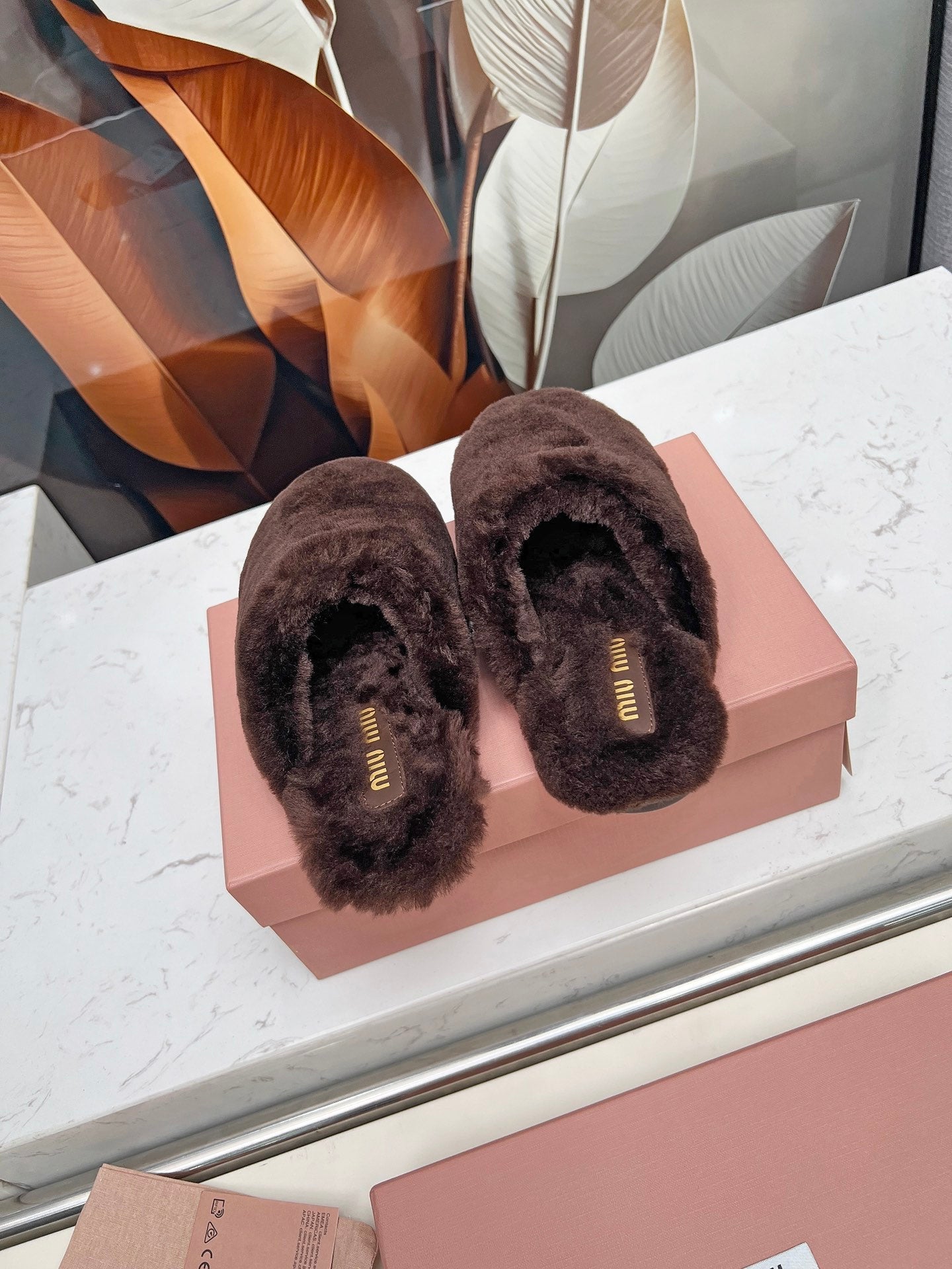 MIUMIU 26S MULES IN DARK BROWN SHEARLING 