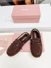 MIUMIU 26S BOAT LOAFERS IN DARK BROWN SHEARLING