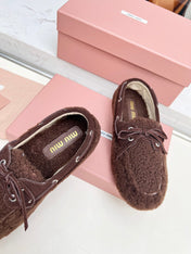 MIUMIU 26S BOAT LOAFERS IN DARK BROWN SHEARLING