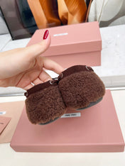 MIUMIU 26S BOAT LOAFERS IN DARK BROWN SHEARLING