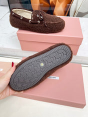 MIUMIU 26S BOAT LOAFERS IN DARK BROWN SHEARLING