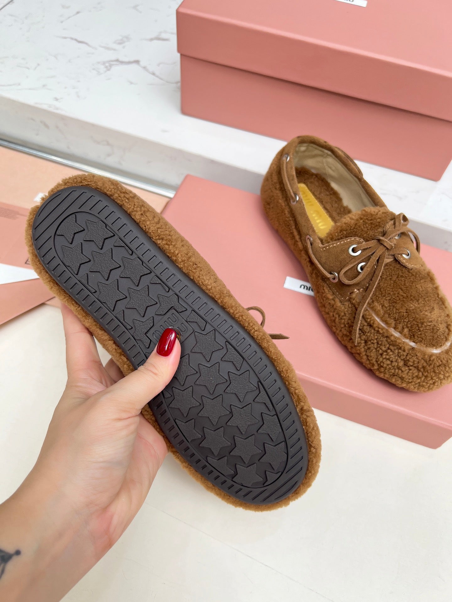 MIUMIU 26S BOAT LOAFERS IN BROWN SHEARLING