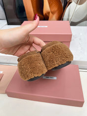 MIUMIU 26S BOAT LOAFERS IN BROWN SHEARLING