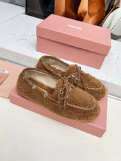 MIUMIU 26S BOAT LOAFERS IN BROWN SHEARLING