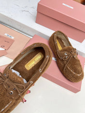 MIUMIU 26S BOAT LOAFERS IN BROWN SHEARLING