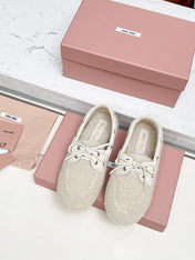 MIUMIU 26S BOAT LOAFERS IN BEIGE SHEARLING