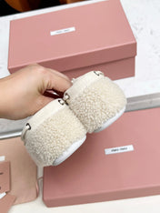 MIUMIU 26S BOAT LOAFERS IN BEIGE SHEARLING