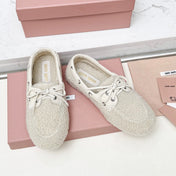 MIUMIU 26S BOAT LOAFERS IN BEIGE SHEARLING