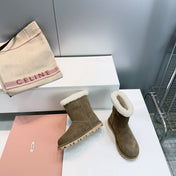MIUMIU 25S BOOTIES IN DARK BROWN SUEDE AND SHEARLING