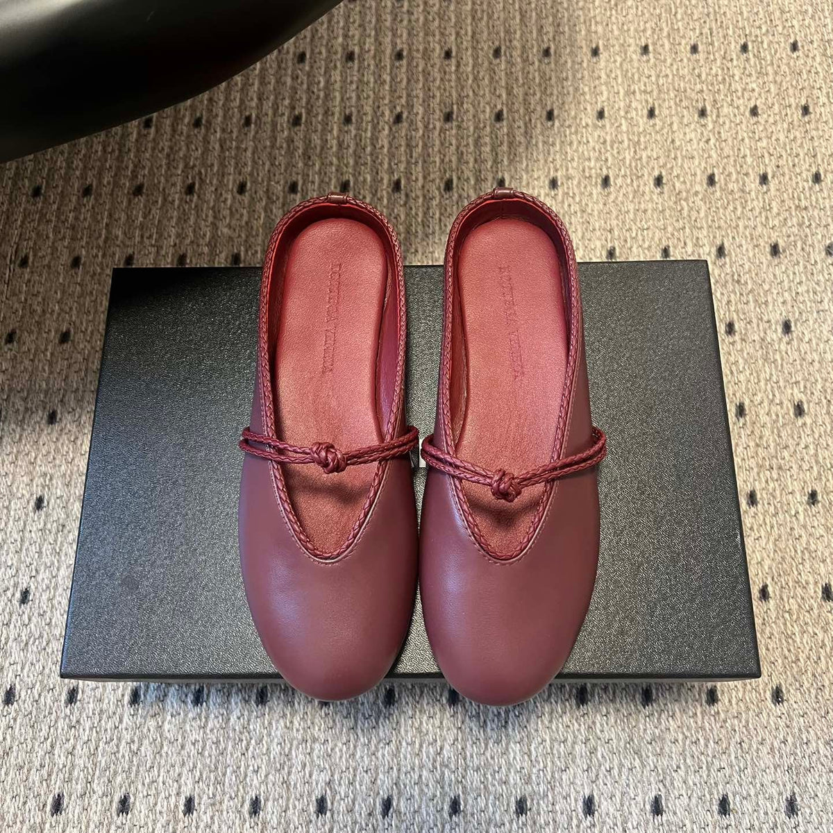 BOTTEGA VENETA 26S FLAT MULES IN DARK RED LAMBSKIN