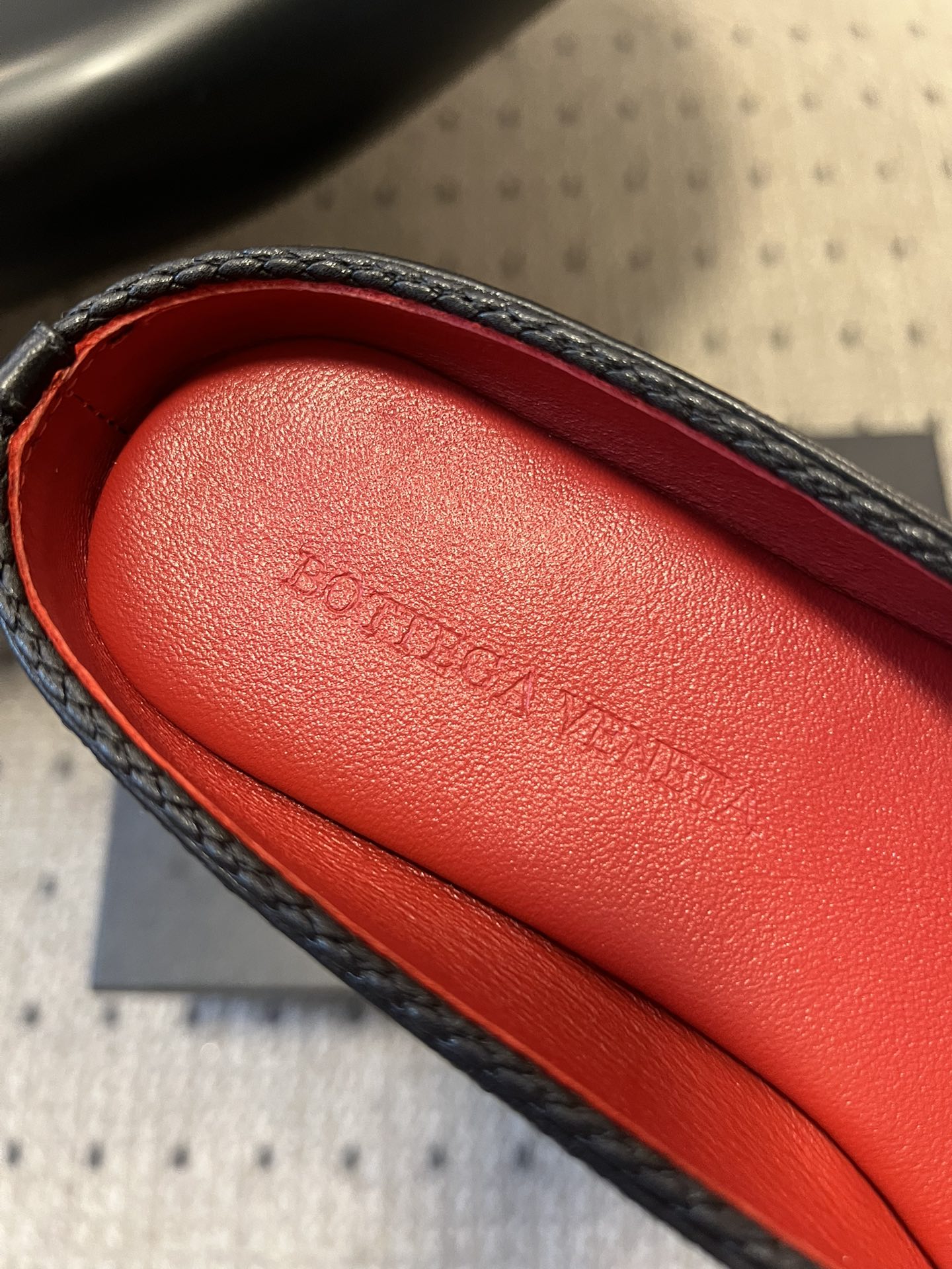 BOTTEGA VENETA 26S FLAT MULES IN BLACK LAMBSKIN