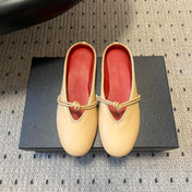 BOTTEGA VENETA 26S FLAT MULES IN BEIGE LAMBSKIN