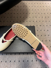 BOTTEGA VENETA 26S FLAT MULES IN CREAM WHITE LAMBSKIN