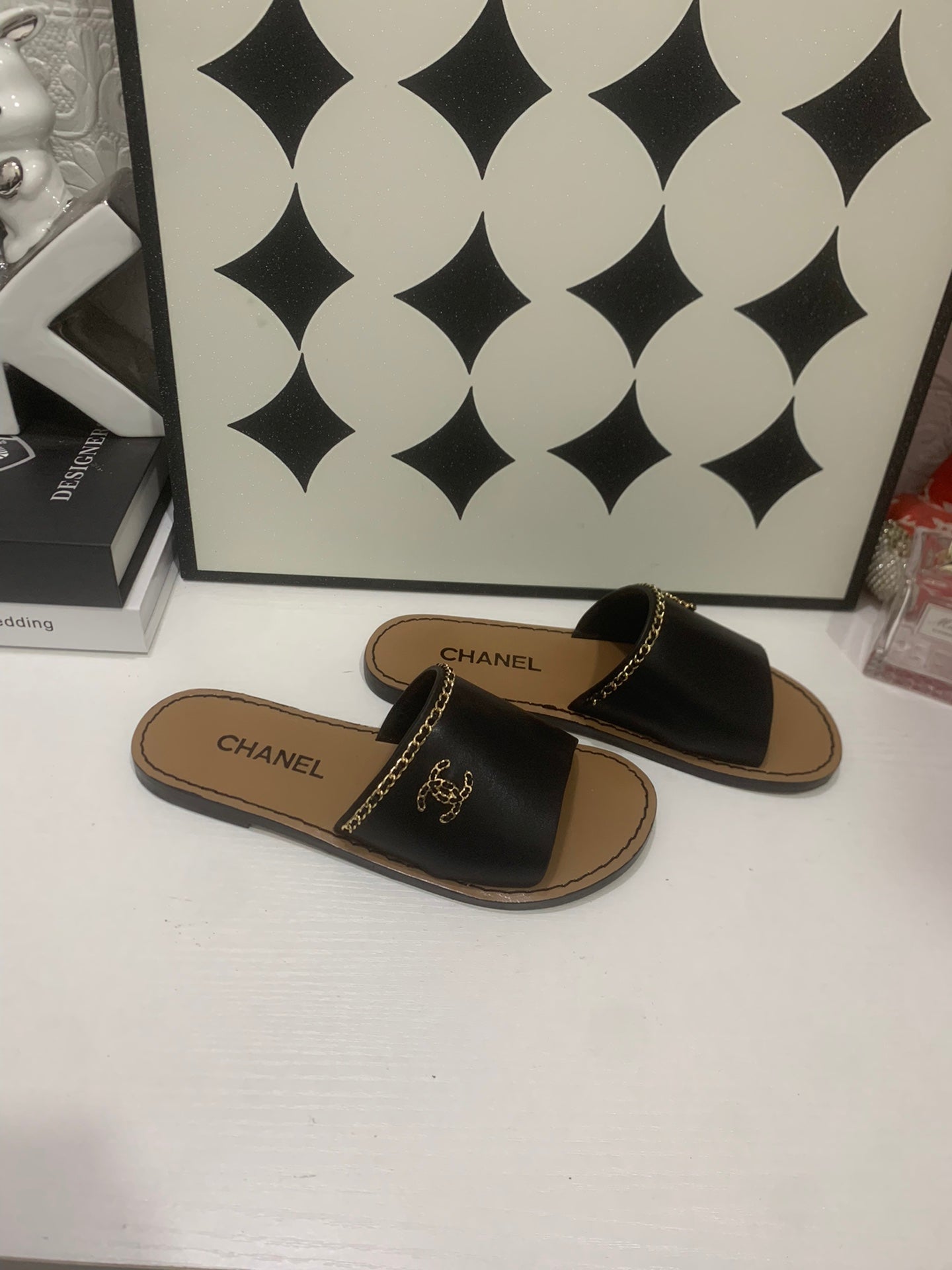 CHANEL 26S SANDALS IN BLACK CALFSKIN GOLD-TONE CHAIN DETAIL