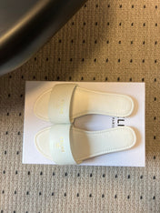 CELINE 26S FLAT SLIDES IN WHITE LAMBSKIN