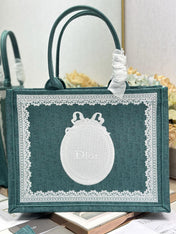 DIOR 26S BOOK TOTE BAG 36 IN TEAL GREEN AND WHITE BAYADERE FABRIC