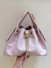 CHANEL 25 MEDIUM HANDBAG IN PASTEL PINK CALFSKIN WITH GOLD HARDWARE