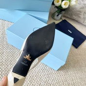 PRA SLINGBACK PUMPS IN CREAM CALFSKIN