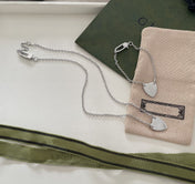 GG LOGO HEART-SHAPED PENDANT SILVER BRACELET