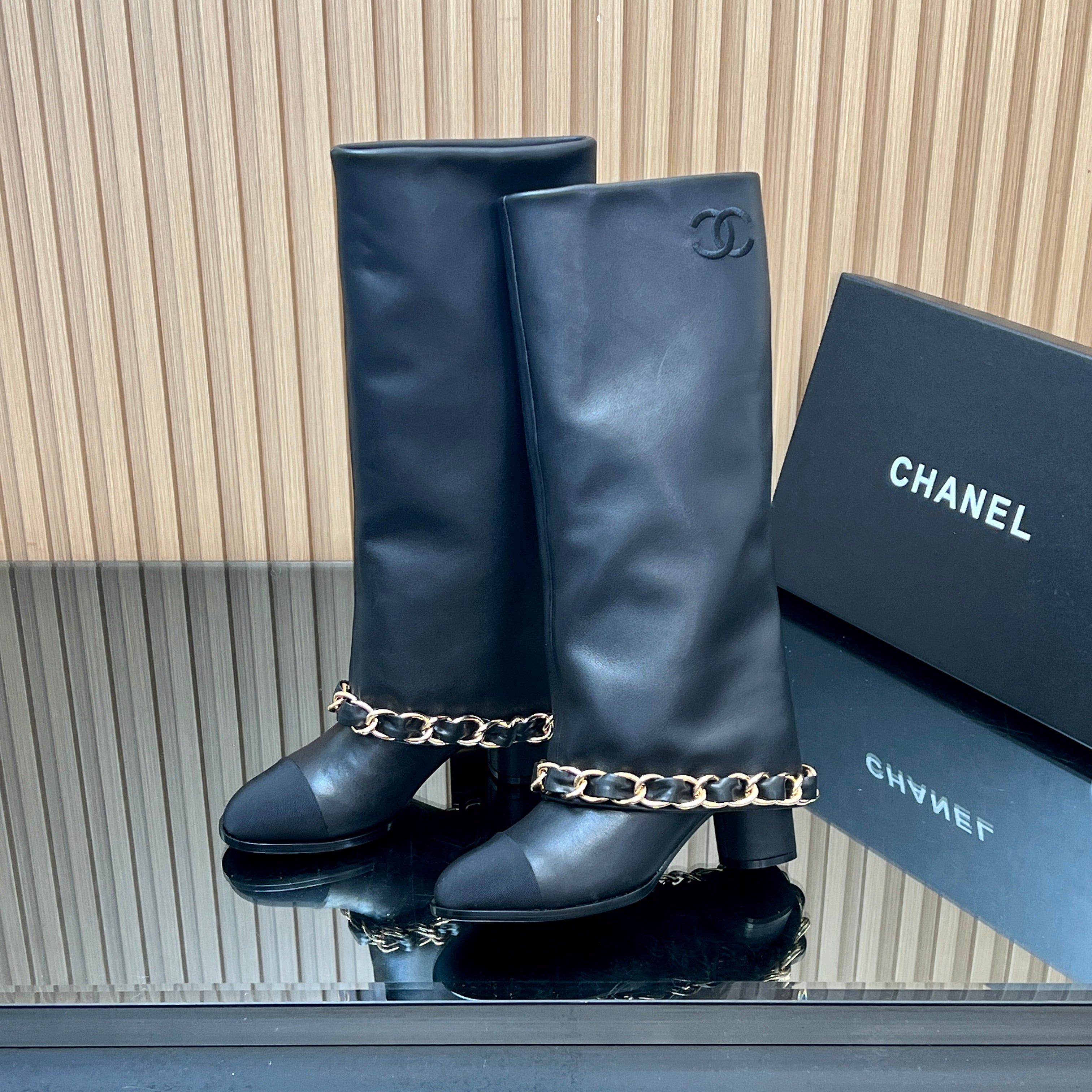 CHANEL 25S KNEE-HIGH HEELED BOOTS 65MM IN BLACK CALFSKIN GOLD HARDWRE