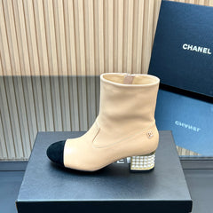 CHANEL 25S TALL BOOTS WITH PEARL DETAILS 50MM IN BEIGE CALFSKIN AND BLACK SUEDE