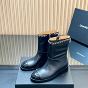 CHANEL 25S SHORT BOOTS WITH CHAIN IN BLACK CALFSKIN