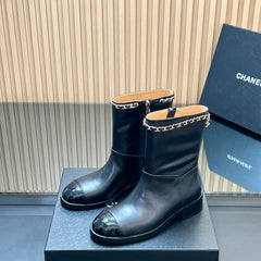 CHANEL 25S SHORT BOOTS WITH CHAIN IN BLACK CALFSKIN
