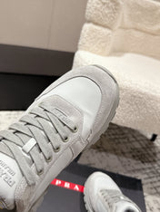 PRADA 25S MEN SNEAKERS LOGO IN WHITE AND LIGHT GRAY NUBUCK AND CANVAS