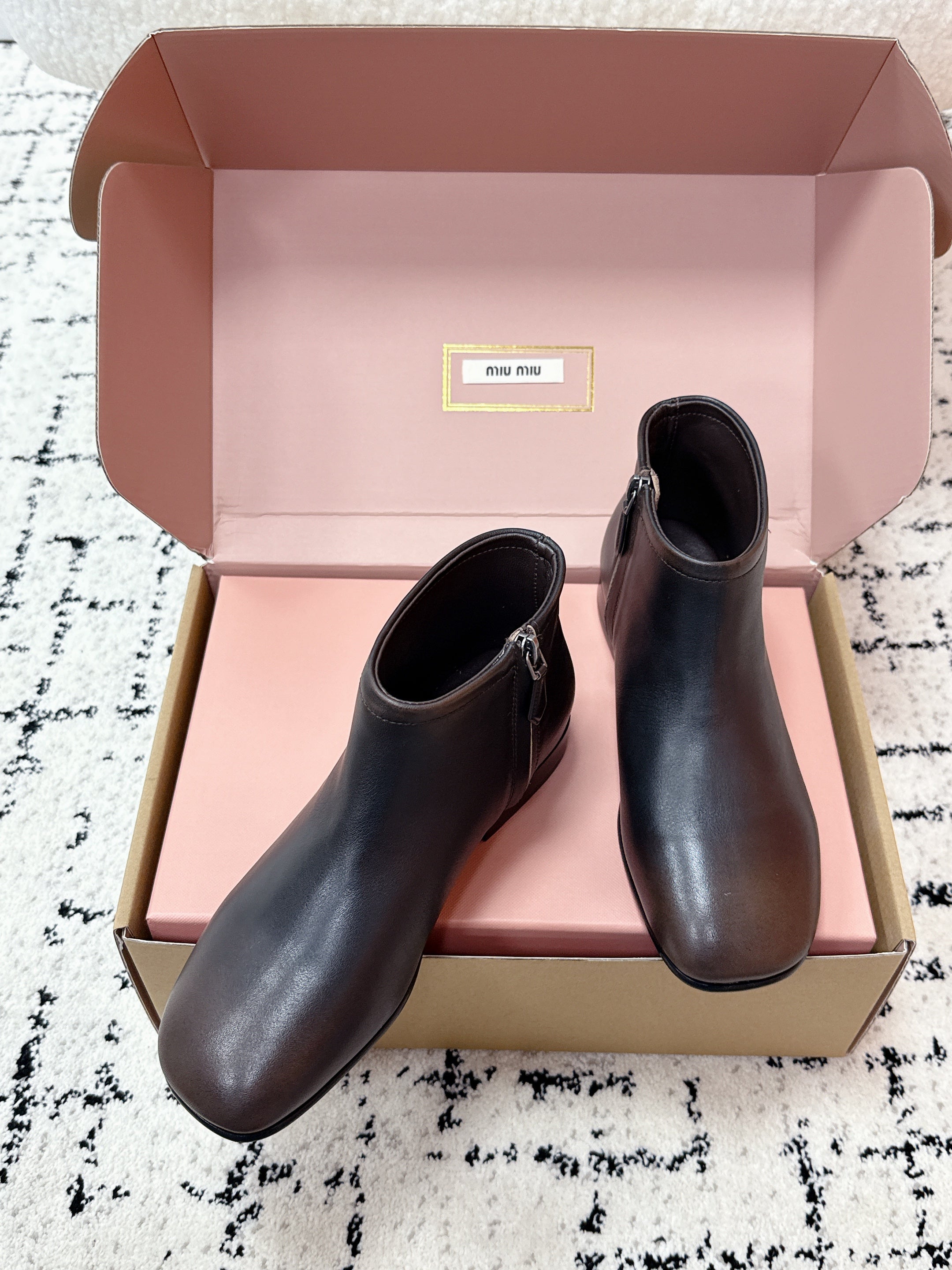 MIUMIU 26S BOOTIES IN DARK BROWN  FUME CALFSKIN