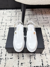 CHANEL 26S SLINGBACK LOAFERS IN WHITE PATENT CALFSKIN WITH CC LOGO
