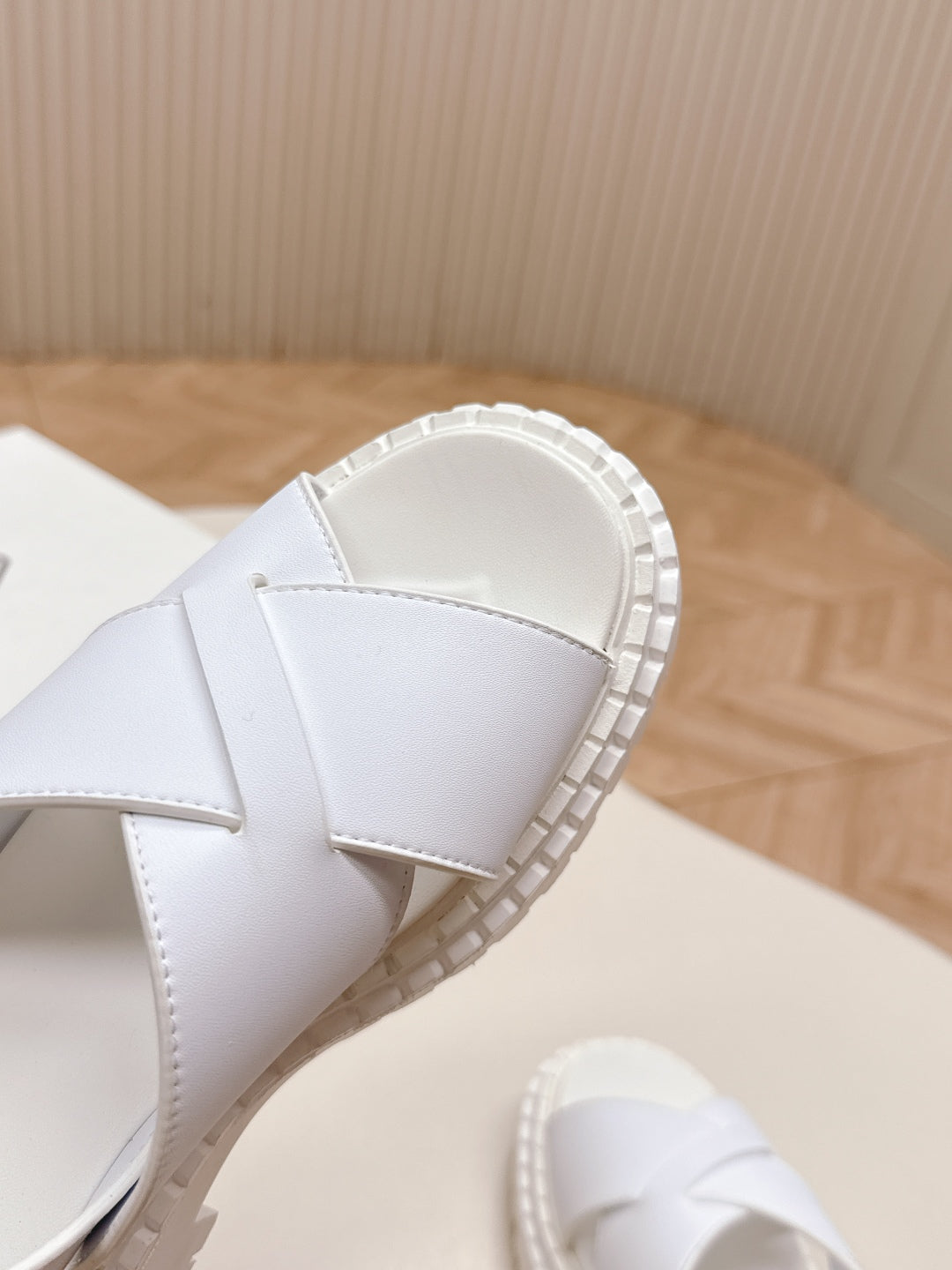 PRADA 25S CRISSCROSS SANDALS IN WHITE CALFSKIN