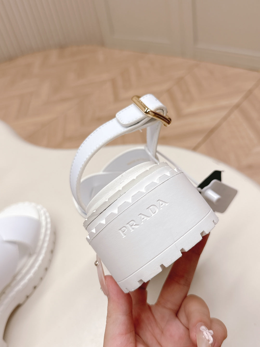 PRADA 25S CRISSCROSS SANDALS IN WHITE CALFSKIN