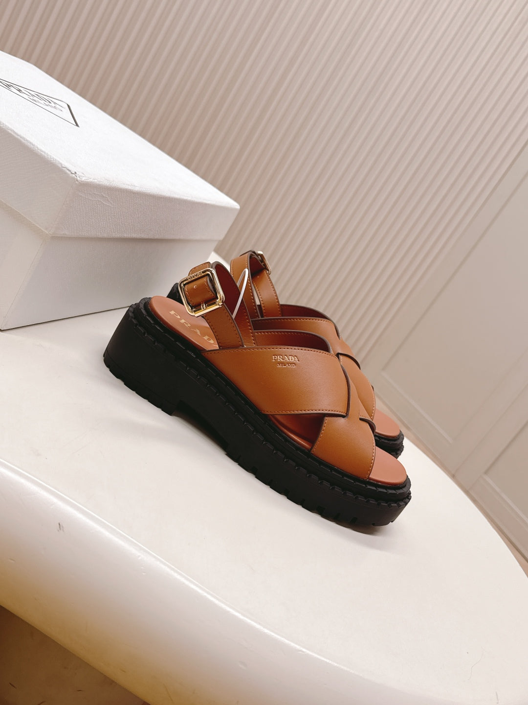 PRADA 25S CRISSCROSS SANDALS IN LIGHT TAN CALFSKIN