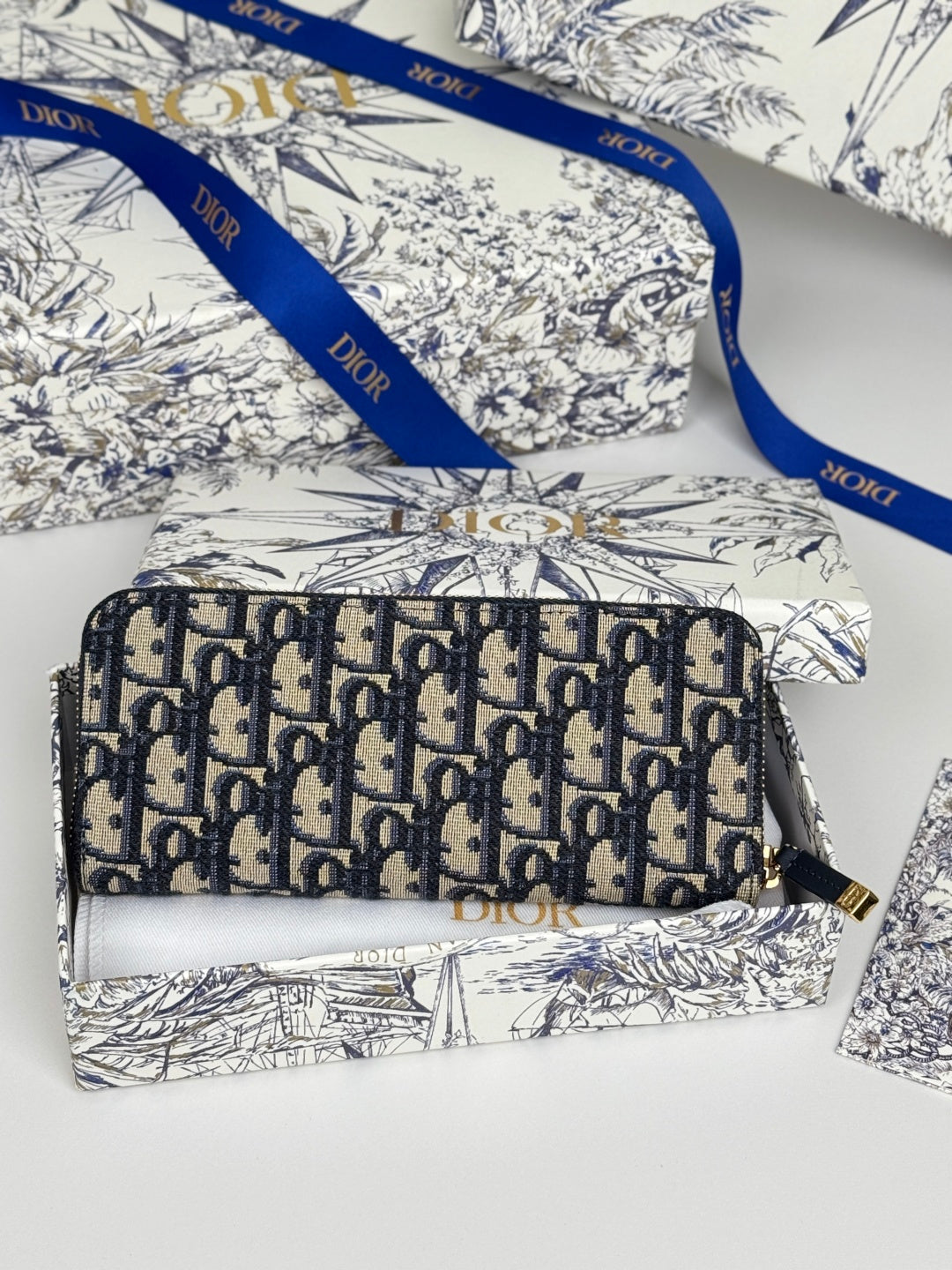 DIOR 25S LONG ZIPPER WALLET 19 IN BLUE OBLIQUE JACQUARD CANVAS