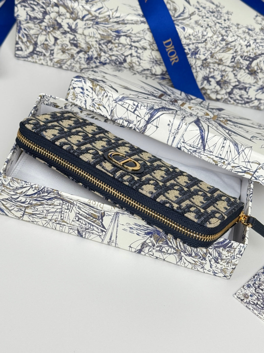 DIOR 25S LONG ZIPPER WALLET 19 IN BLUE OBLIQUE JACQUARD CANVAS
