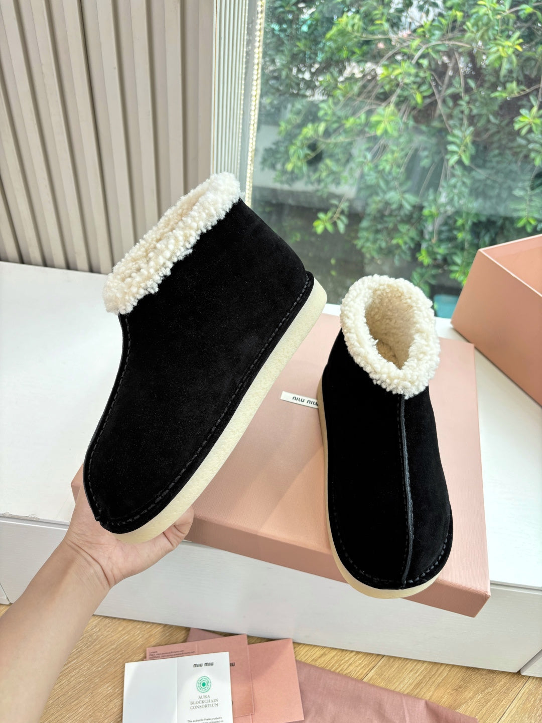MIUMIU 26S ANKLE BOOTS IN BLACK SUEDE AND SHEARLING