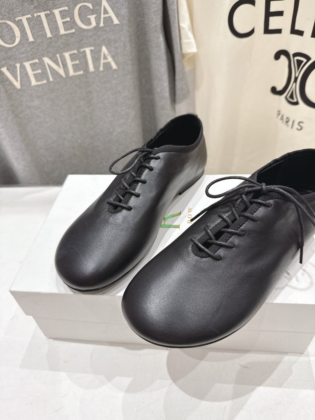 THE ROW 26S MINIMAL LACE-UP SHOES IN BLACK CALFSKIN