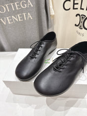 THE ROW 26S MINIMAL LACE-UP SHOES IN BLACK CALFSKIN