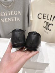 THE ROW 26S MINIMAL LACE-UP SHOES IN BLACK CALFSKIN