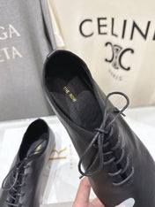 THE ROW 26S MINIMAL LACE-UP SHOES IN BLACK CALFSKIN